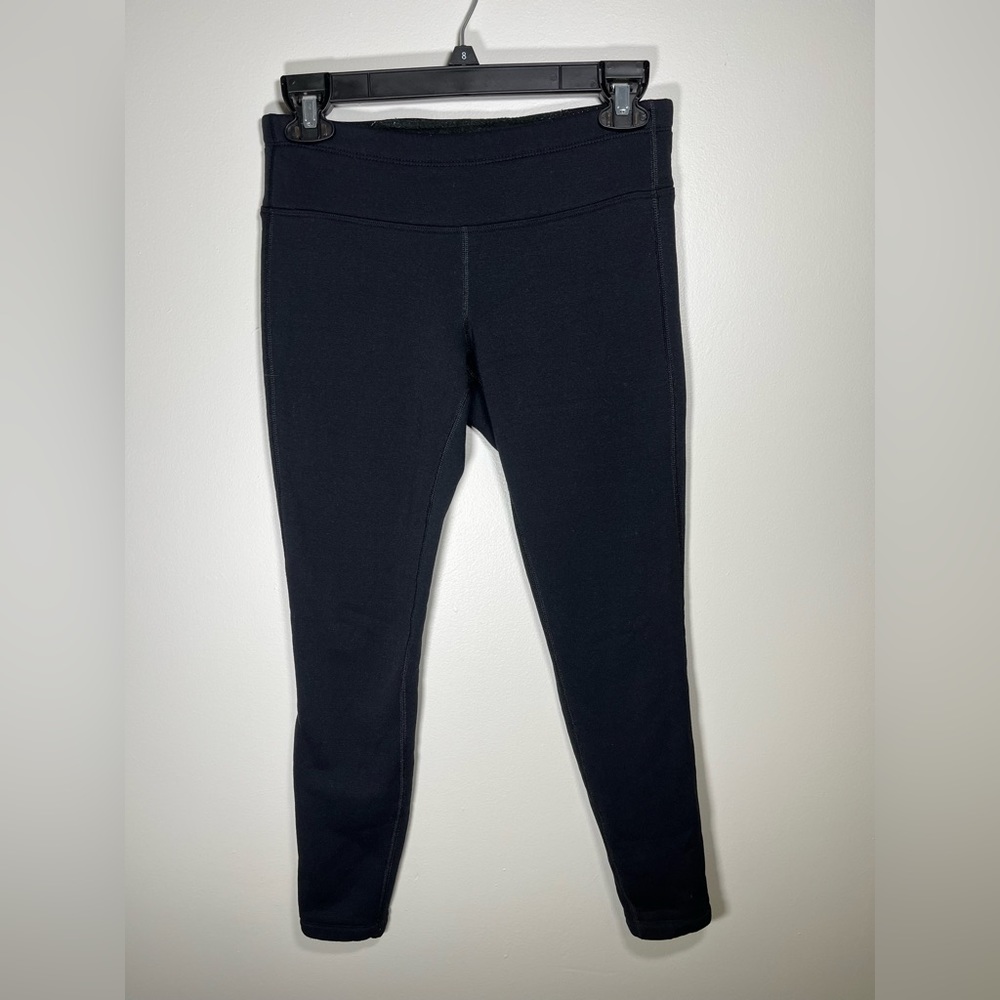 Athleta black fleece lined leggings with zipper in the back size small